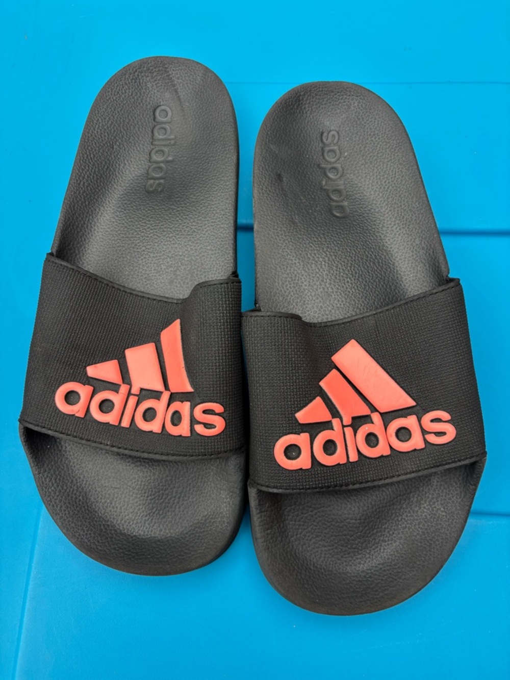 adidas Black Slides with Coral Logo Accents